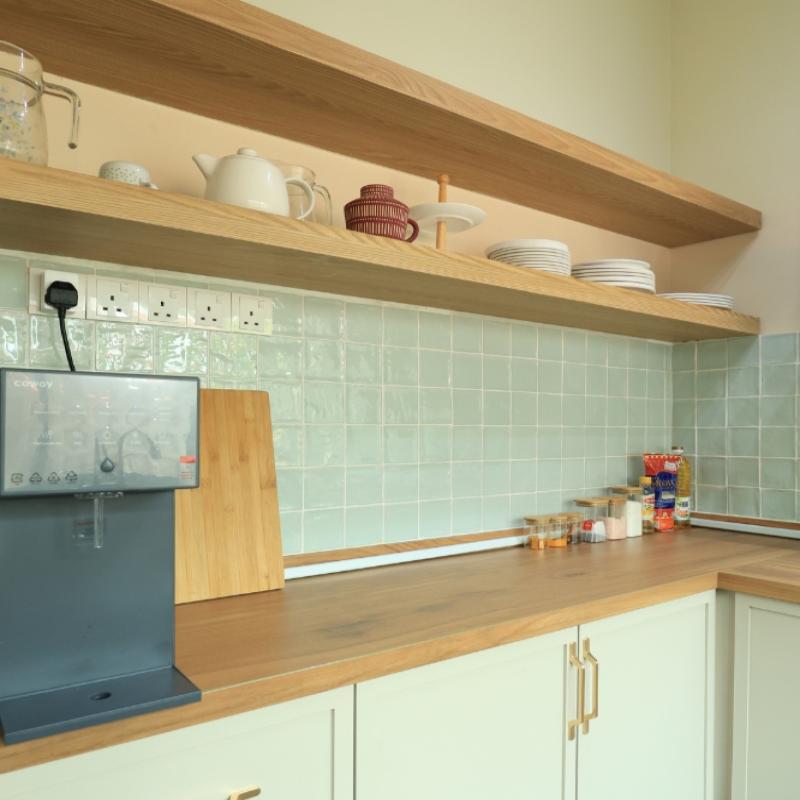 Custom cabinets provide wider spaces for small homes