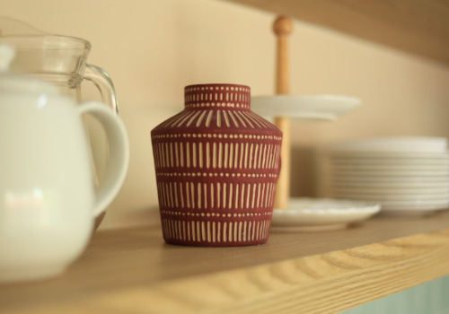 Open shelves to reduce visual weight in kitchens